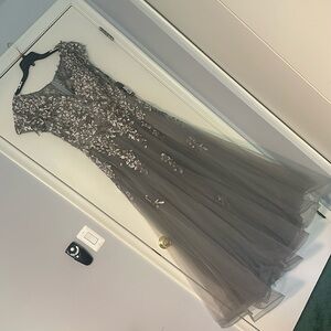 Beautiful mother of the bride ball gown.Tulle bottom floral embroidery, beading.